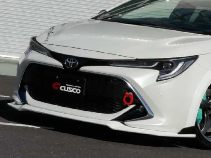 Cusco 19+ Toyota Corolla Hatchback Front Lip Spoiler (Primer/Unpainted) 1